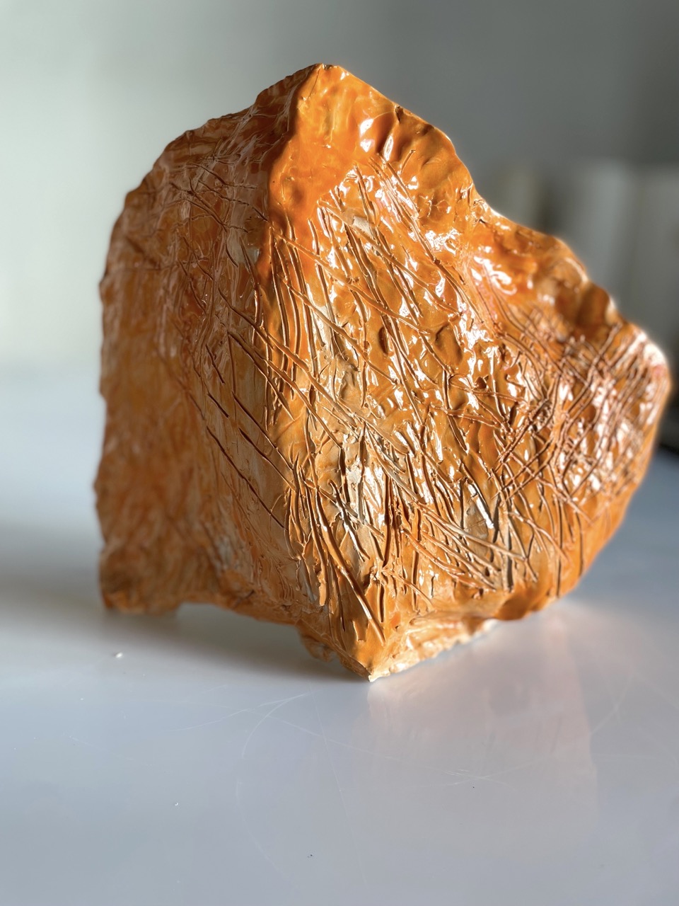 Florian Mehnert, orange glazed ceramic, 2025